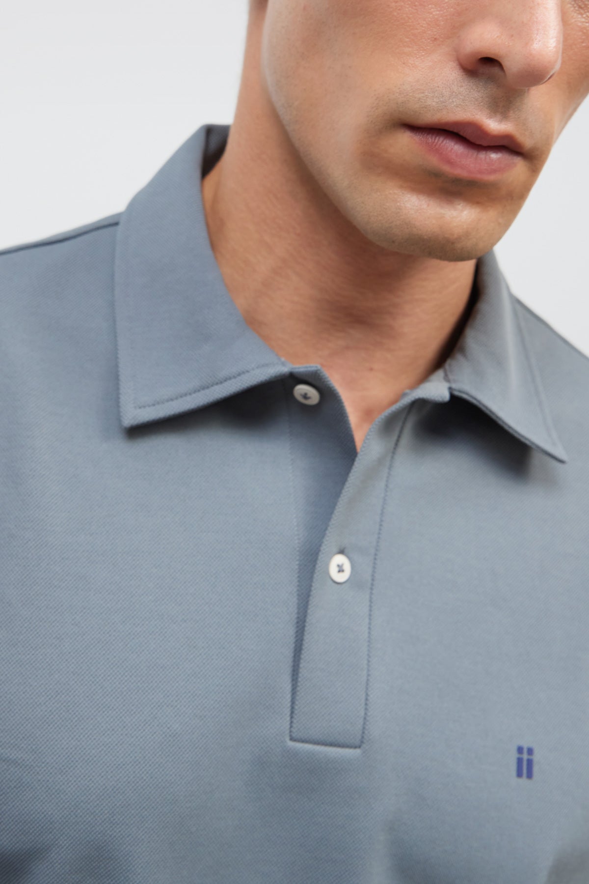 polo manga larga azul grisaceo ranger detalle