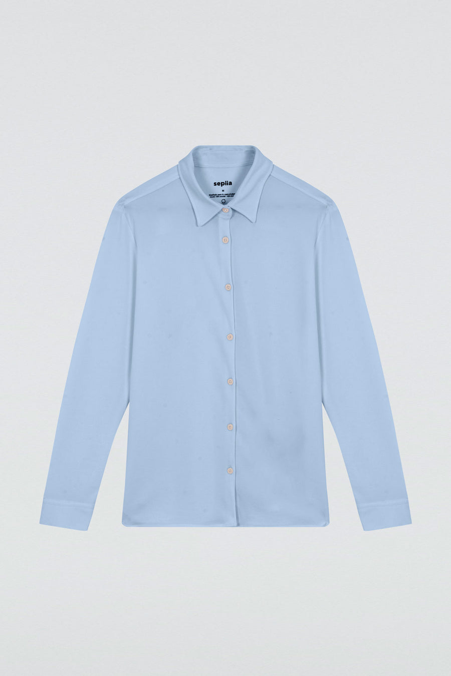Camisa azul cabo oversized para mujer de manga larga, de la marca Sepiia. Estilo holgado para realzar tu look con elegancia y comodidad. Foto plano