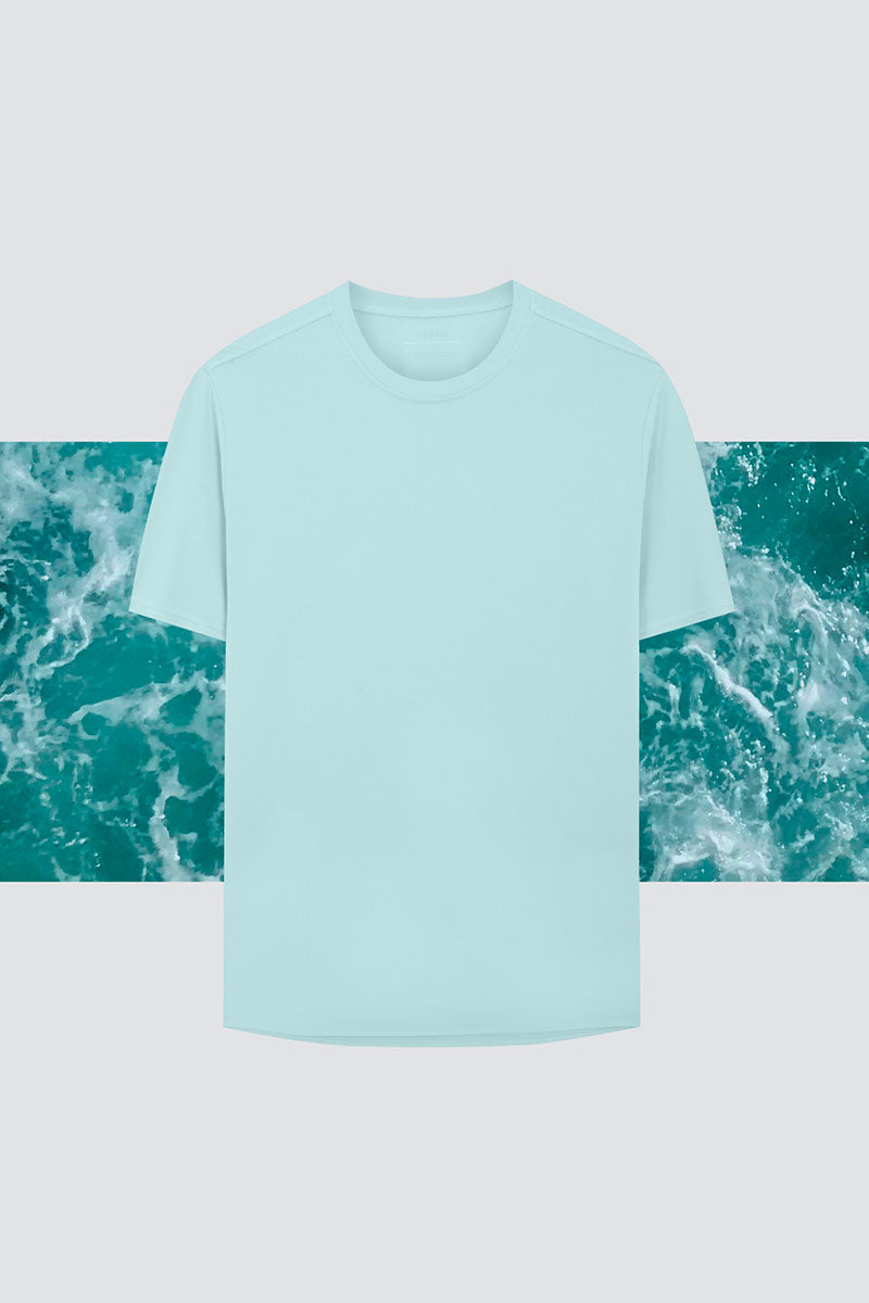 Camiseta ICE para mujer en azul aqua de Sepiia, fresca y resistente a manchas y arrugas. Foto plano
