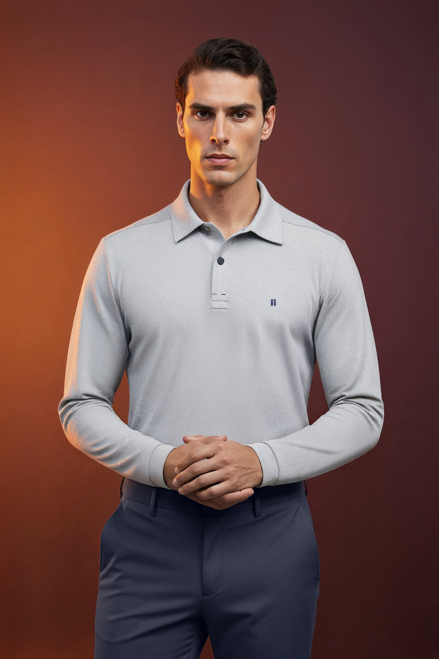 Polo manga larga gris warm plano medio 