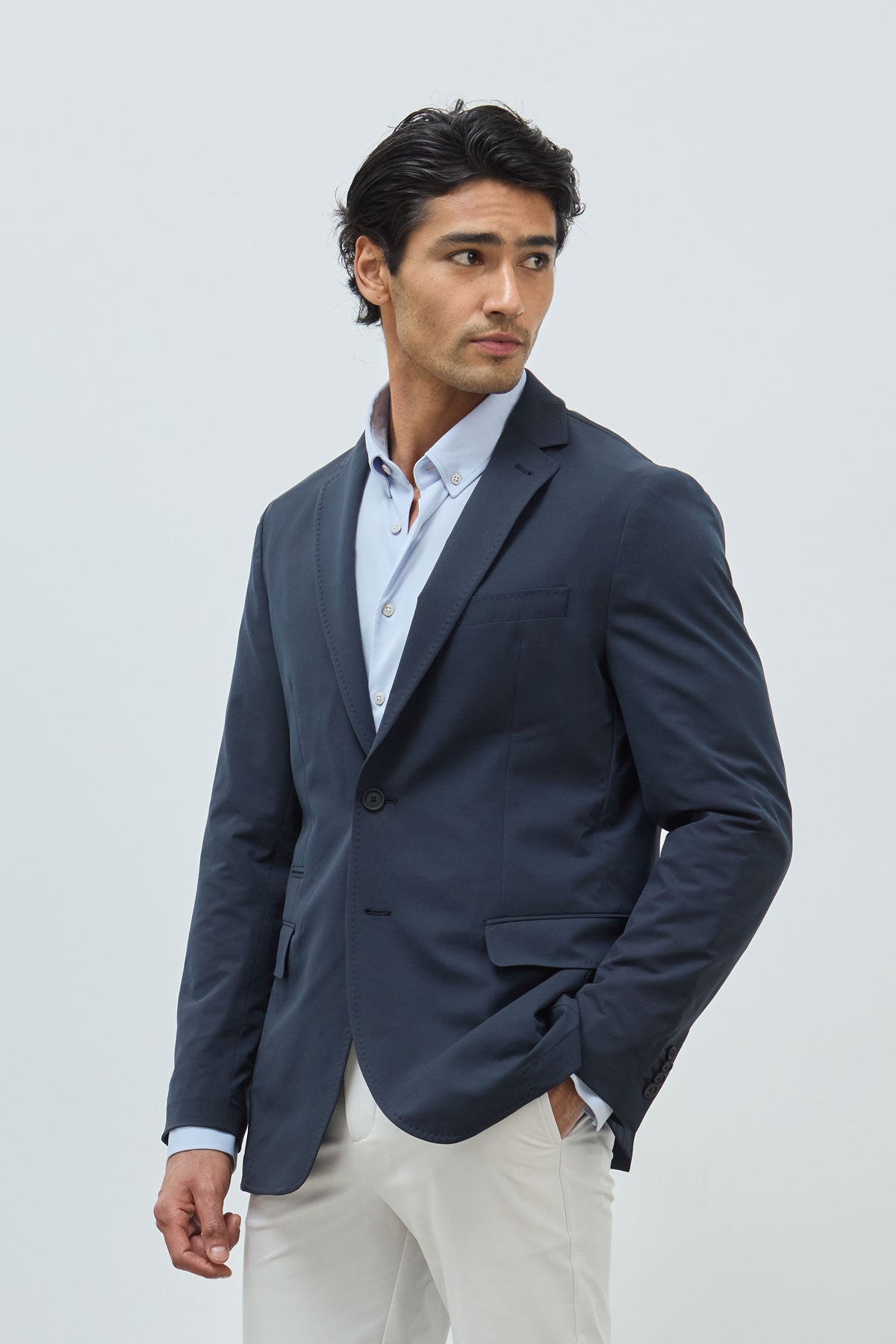 traje completo ice azul marino. foto americana de frente.